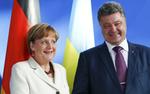 Порошенко договорился с Меркель о проведении видеоконференции с ополченцами