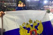 Американский болельщик развернул на трибунах флаг России на открытии Олимпиады