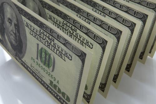 Экономист Разуваев: США придется отказаться от доллара из-за большого объема госдолга  