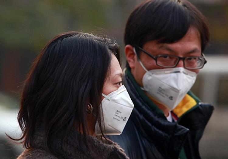 Жителей Шанхая поглотил желтый туман (ФОТО)