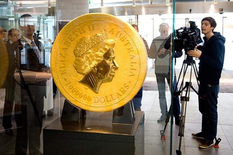 Монета с портретом Путина ознаменует присоединение Крыма