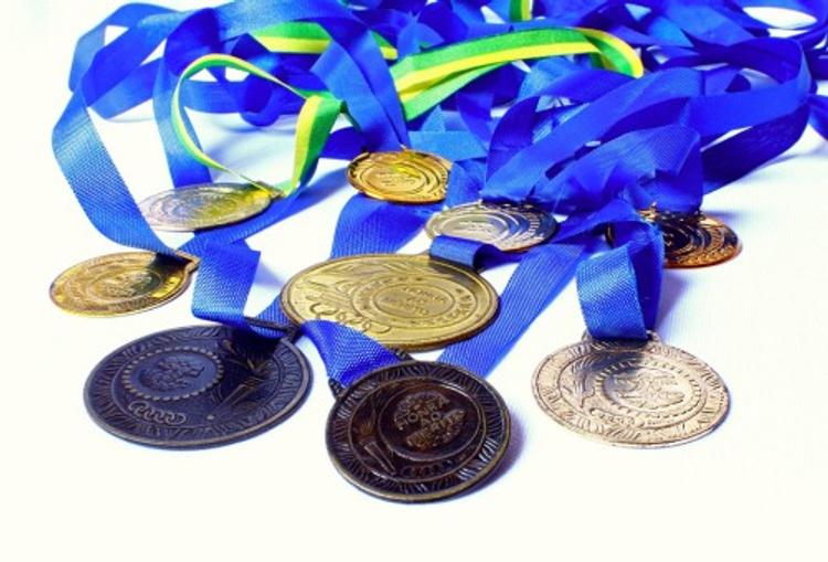 МОК лишил олимпийских медалей четверых россиян