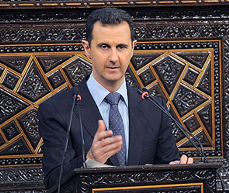 Турция отказалась от требования ухода Асада