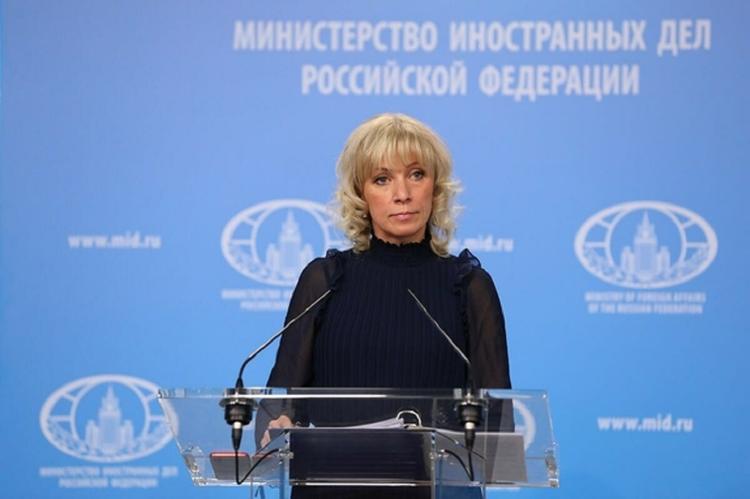 Захарова прокомментировала выступление Порошенко с флагом ЕС в Мюнхене