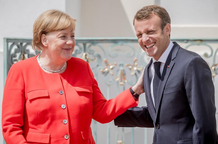 Меркель и Макрон снова едут в Россию – теперь на ЧМ-2018