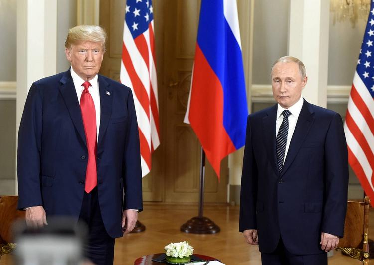 На июльской обложке Time изображено лицо с чертами Путина и Трампа