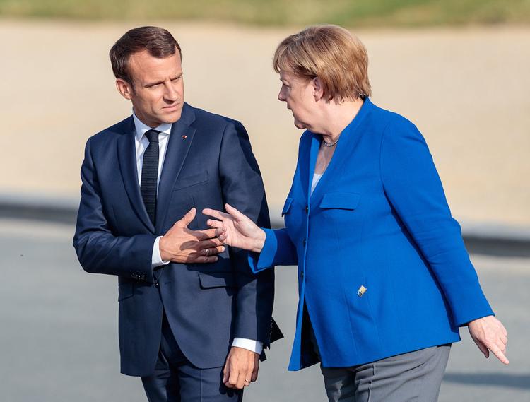 Названы возможные темы сегодняшних переговоров Меркель и Макрона