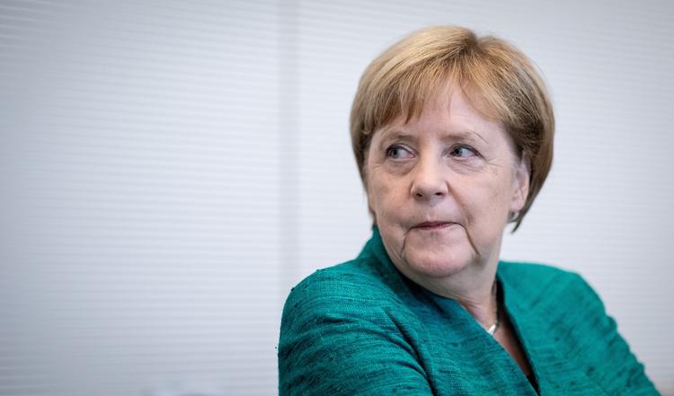 Меркель: ФРГ не намерена игнорировать применение химоружия в Сирии