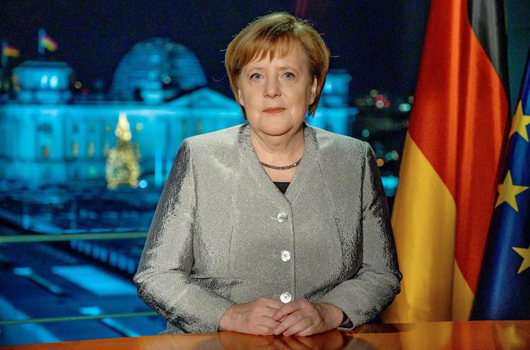 Меркель: Германии следует взять на себя больше ответственности
