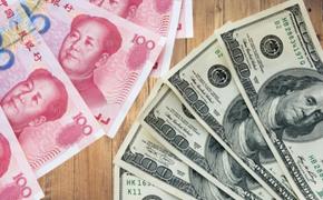 Экономист Хандруев: Сразу же невозможно будет заместить доллары и евро юанем