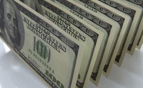 Экономист Разуваев: США придется отказаться от доллара из-за большого объема госдолга  