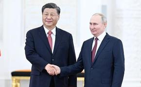 Националисты Латвии в бешенстве от встречи президента России и лидера Китая