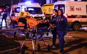 Shot: 12 тел людей остаются под завалами после теракта в «Крокусе»