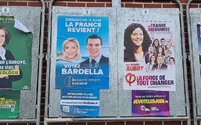 Партия Ле Пен и Барделлы лидирует в первом туре парламентских выборов во Франции