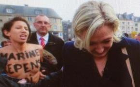 Активистки Femen обнажились перед крайне правой Марин Ле Пен (ВИДЕО)