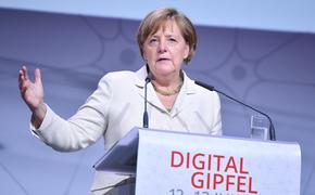 Меркель осудила введение США новых антироссийских санкций