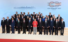 Лидеры  G20 учли в итоговом коммюнике особую позицию США  по двум темам