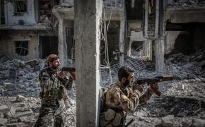 Возглавляемая США коалиция позволила боевикам ИГ покинуть Ракку