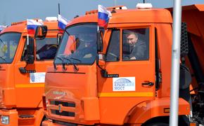 Путин вёл  машину в колонне спецтехники на открытии Крымского моста